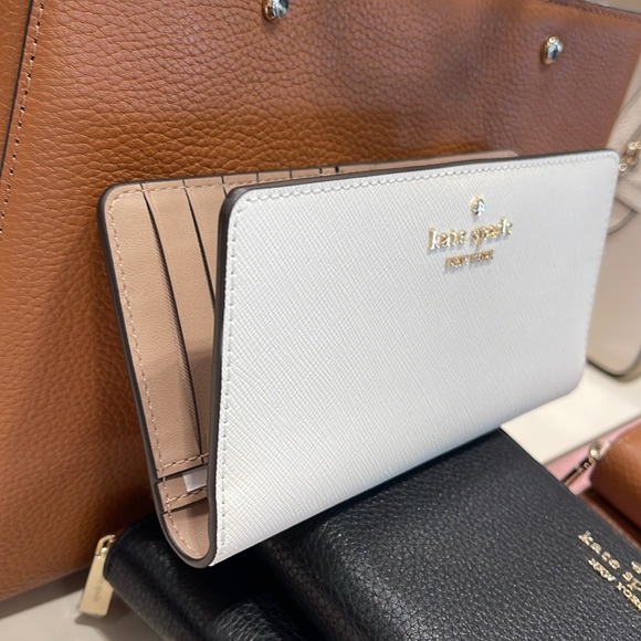 Kate Spade Madison Large Slim Bifold Wallet
Meringue 
NWT - Picture 14 of 16